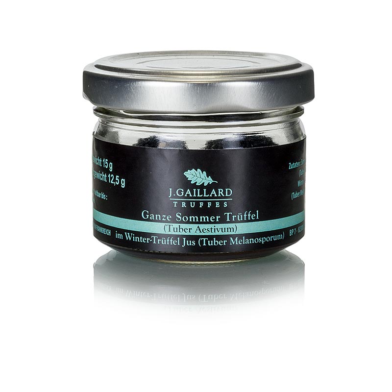 Truffes d'été entières cuites dans le jus de truffes d'hiver, idéales pour les terrines et les sauces