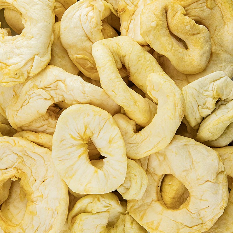 Getrocknete und geschwefelte Apfelringe, ideal als Snack oder zum Backen, konserviert durch Entzug von Wasser und geeignet für Müsli, Gebäck, Füllungen und Garnierung verschiedener Gerichte Hergestellt aus vollreifen, süßen und aromatischen Äpfeln, die mit Heißluft getrocknet wurden