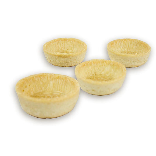 Runde, 5 cm große, helle, salzige Snack-Tartelettes, ideal für kalte und warme Küche, gefüllt mit pikanten Aperitif-Masse für garantierten Erfolg