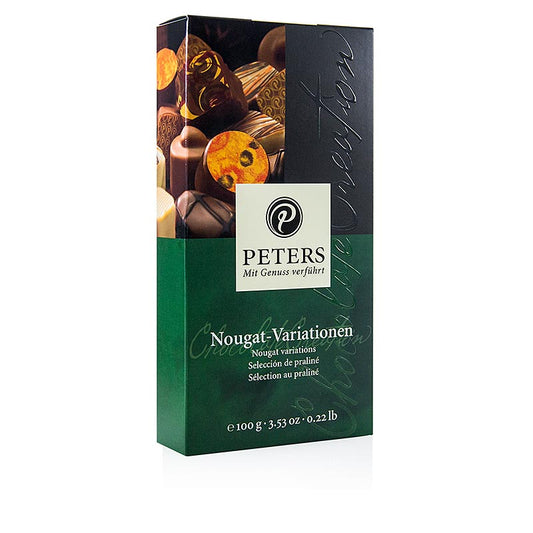 Kollektion von 8 verschiedenen Nougatpralinen ohne Alkohol, darunter Haselnussnougat, Knuspertraum und Mandelpraline, kreativ verfeinert und dekoriert
