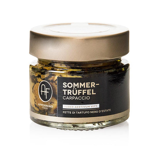 Schwarze Sommertrüffel in hauchdünne Scheiben geschnitten, leicht gesalzen und in feinem Olivenöl eingelegt, Carpaccio mit intensivem Trüffelgeschmack, ideal für Käse, Nudeln oder Fleischgerichte