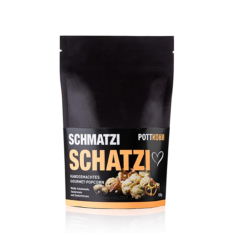 Luftiges Popcorn mit weißer belgischer Schokolade, kleinen Zuckerherzen und Salzbrezeln