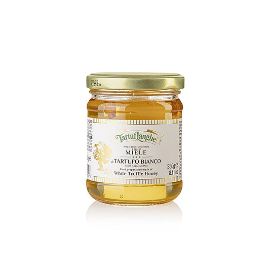 Hellbrauner Tartuflanghe Akazienhonig mit weißem Trüffel aus dem Piemont, ideal zum Veredeln von Käse und zum Genießen mit lauwarmem Ziegenkäse