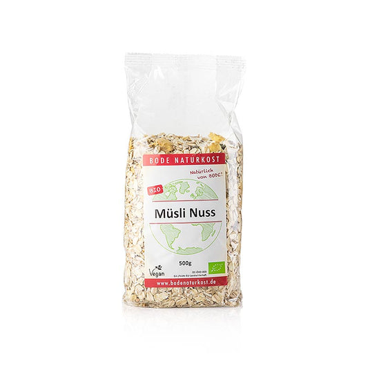 Müsli, mit Nuss, BIO, 500 g - Eine köstliche Mischung aus Haferflocken, Leinsaat, Sonnenblumenkernen, geröstetem Buchweizen und Haselnusskernen für ein abwechslungsreiches und köstliches Frühstück, das mit Milch, Joghurt oder Nussdrinks und frischen Früchten serviert wird