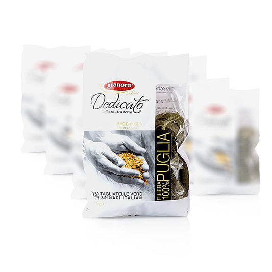 Tagliatelle Nidi Spinaci von Granoro Dedicato, hergestellt aus apulischem Hartweizengrieß ohne Eier, mit Bronze-Matritzen, 100% apulischer Weizen, Förderung der Nachhaltigkeit und Tradition der apulischen Landwirtschaft