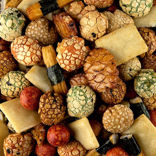 Close-up image of Erdnuss & Reis Cracker Knabbermix Superior 750 g snack mix in a clear packaging, featuring a combination of peanuts and rice crackers for a satisfying and flavorful snack option (English)