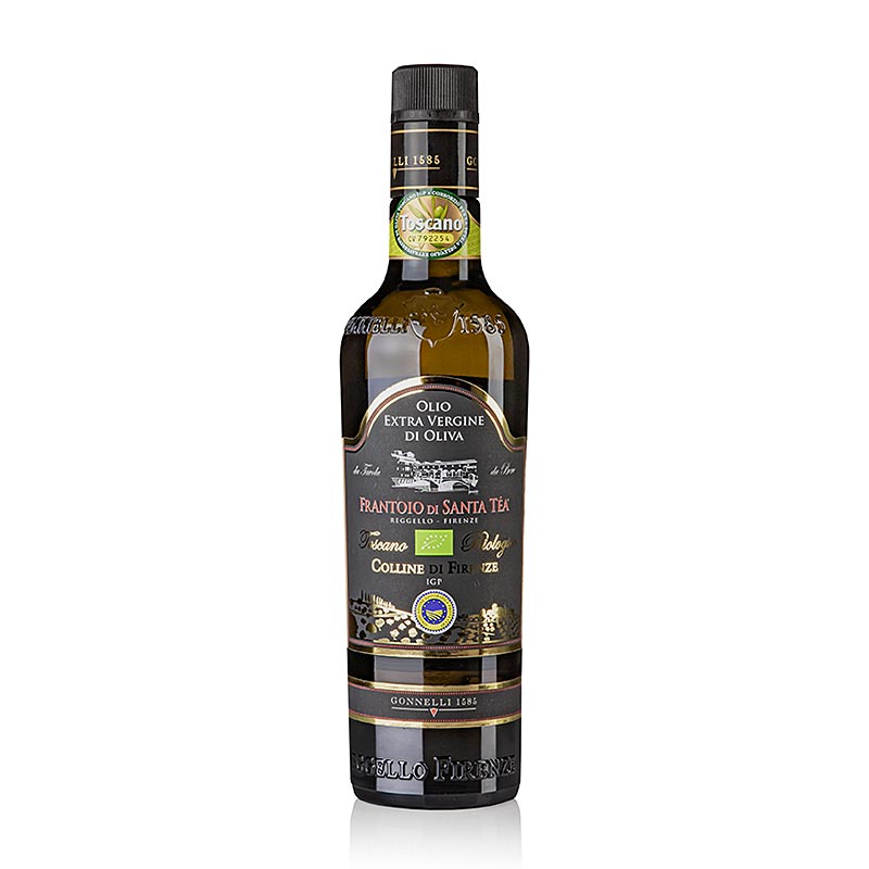 Flasche natives Olivenöl Extra Santa Tea Gonnelli Colline di Firenze IGP, BIO, 500 ml, umgeben von grünen Olivenzweigen auf einem rustikalen Tisch