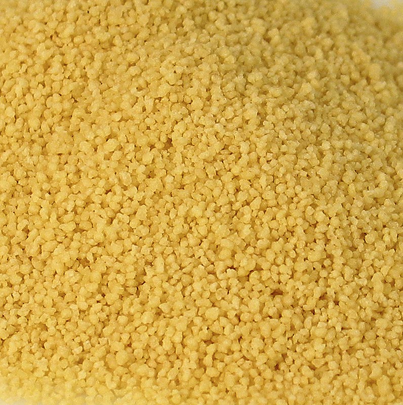 Photo d'un 1 kg couscous grossier, une spécialité traditionnelle d'Afrique du Nord à base de semoule et de farine, qui peut être utilisée cuite à la vapeur comme garniture, dans des salades ou dans différents plats.