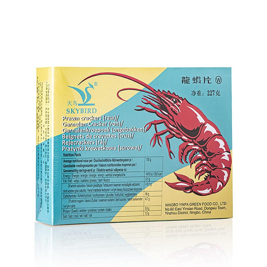 Kroepoek aux crevettes, non cuit, Pigeon, Chine, 227 g - tranches séchées de farine de tapioca et de crevettes moulues, qui grossissent lorsqu'elles sont cuites dans de l'huile chaude et sont consommées avec une table de riz, du vin, de la bière ou des spiritueux
