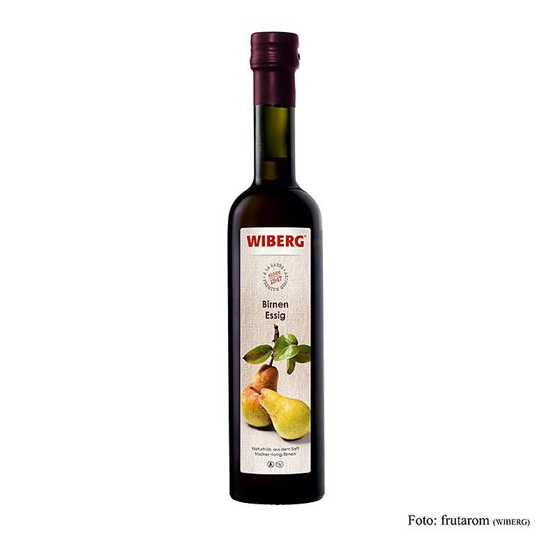 Vinaigre de poires fraîches au miel, naturellement trouble, goût fruité intense, idéal pour les salades et les plats de volaille, présentation décorative