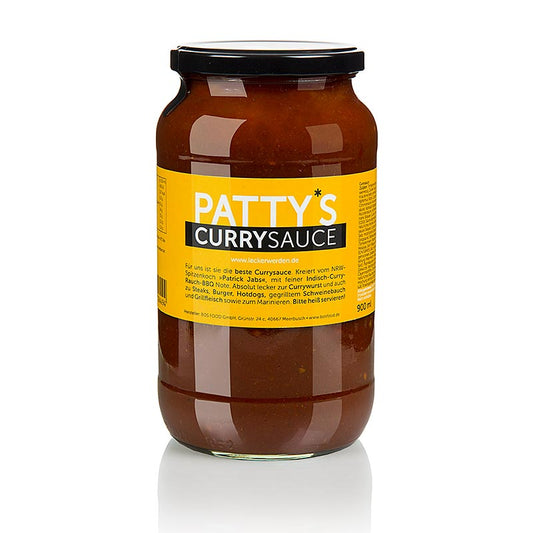 Image d'une bouteille de sauce curry Pattys, créée par Patrick Jabs, 900 ml, sans gluten et sans lactose, avec une fine note de BBQ indien au curry et à la fumée, idéale pour accompagner les saucisses au curry, les steaks, les hamburgers, les hot-dogs et pour mariner Veuillez servir chaud !