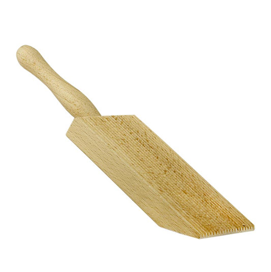 Planche à gnocchi en bois de hêtre avec rainures longitudinales pour les pâtes faites maison