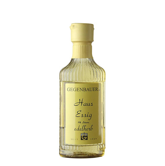 Vinaigre maison brun clair à l'arôme doux et épicé, produit par une ancienne vinaigrerie viennoise