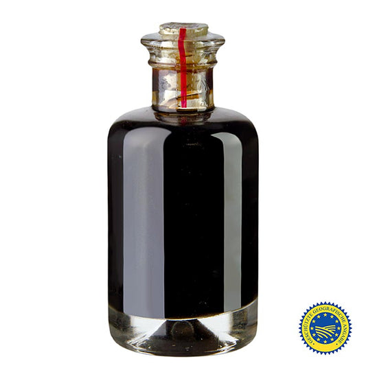 Bouteille-bijou avec 100 ml de Gewürzgarten Aceto Balsamico di Modena ggA, équilibre parfait entre l'acidité naturelle et la douceur due à l'âge, idéal pour les plats et les sauces de qualité ainsi que les salades de fruits et les fraises