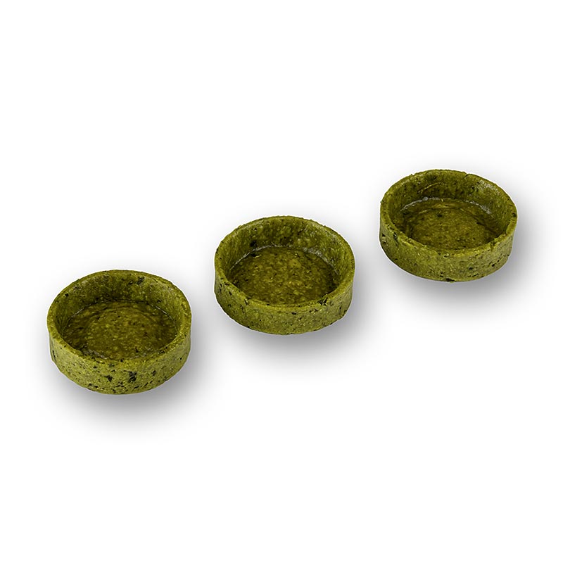 Petites tartelettes croustillantes à base de pâte brisée et de basilic, enrobées, idéales pour des applications salées