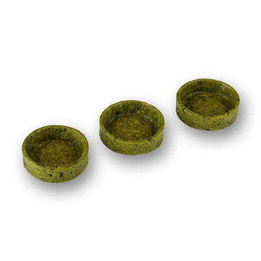Petites tartelettes croustillantes à base de pâte brisée et de basilic, enrobées, idéales pour des applications salées