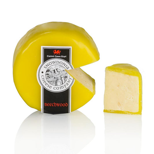 Snowdonia - Beechwood Smoked, Cheddar fumé, cire jaune, 200 g - Cheddar fumé à la texture de noisette et aux subtiles notes fumées, idéal avec les viandes et les burgers, parfait avec une bière corsée
