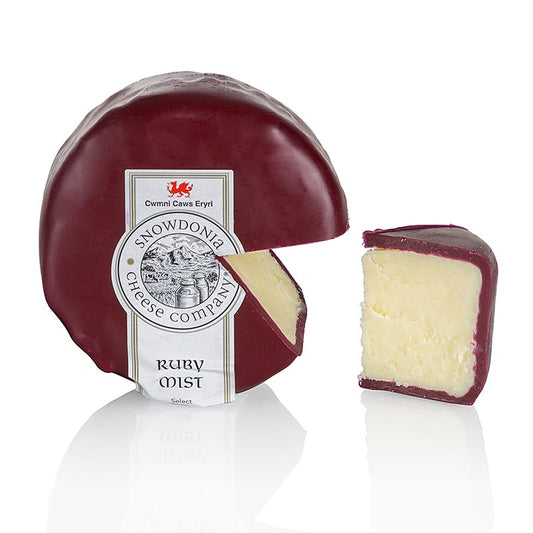 Fromage cheddar artisanal Snowdonia Ruby Mist au porto et au brandy, enrobé d'une couche de cire rouge-brun, paquet de 200 g