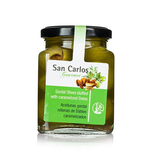 Olives vertes dénoyautées Gordal aux dattes caramélisées, San Carlos, 300 g - Olive Gordal charnue et douce marinée avec des dattes caramélisées sucrées, idéale pour les tapas, le fromage et la salade