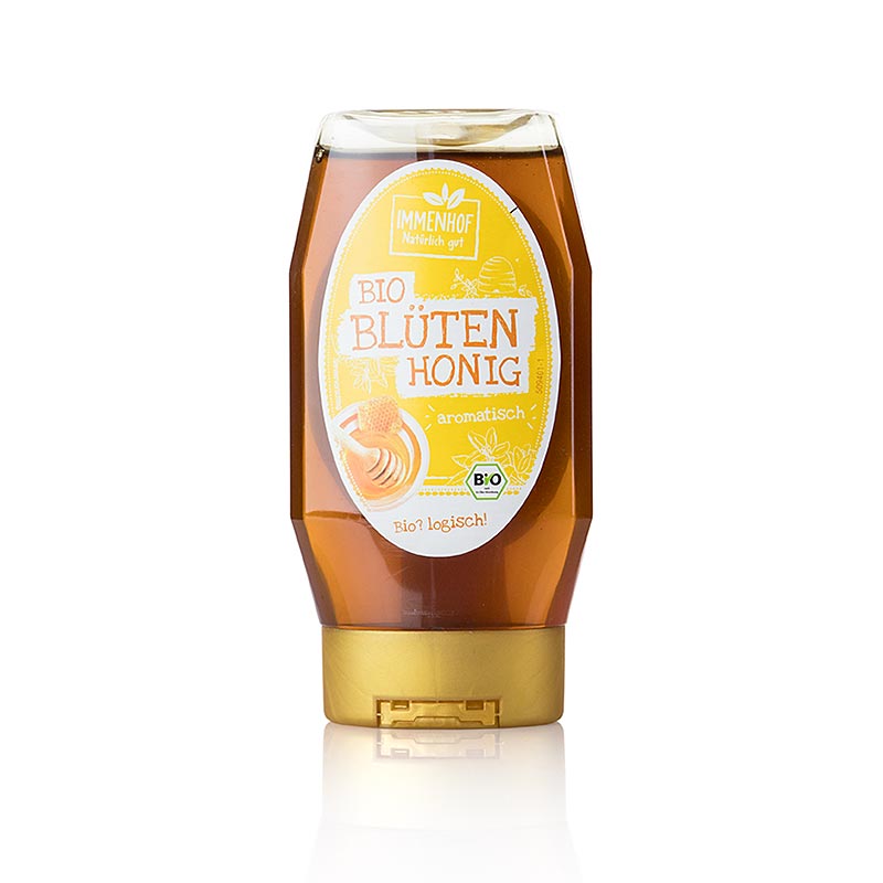 Miel de fleurs bio en bouteille squeeze pratique, idéal pour sucrer le thé ou le pain
