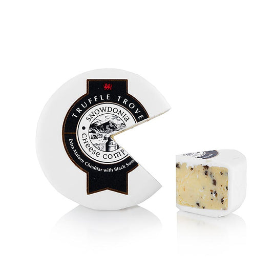 Snowdonia - Truffle Trove, fromage cheddar affiné à la truffe, cire blanche, 150 g : Un délicieux cheddar affiné à la truffe qui nous donne envie de le déguster à la cuillère directement dans le pot.