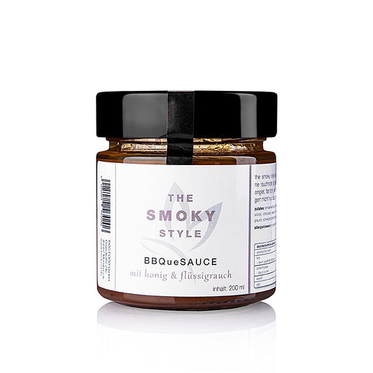 Bouteille de 200 ml de sauce The Smoky Style d'Ernst Petry, agrémentée d'une fine note de fumée et de miel, parfaite pour les morceaux tendres comme l'onglet, le flat iron, le skirt ou le flank steak, idéale pour mariner la viande afin d'obtenir un arôme plus intense et une texture tendre