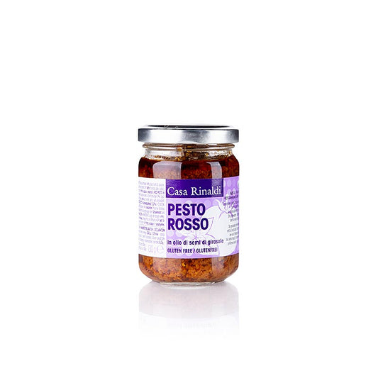 Pesto Rosso de Casa Rinaldi, produit à partir de tomates mûries au soleil et d'huile de tournesol de haute qualité, au goût intense et sucré avec une touche de basilic Utilisation polyvalente dans les pâtes, sur la pizza ou comme dip 130 g Contenu