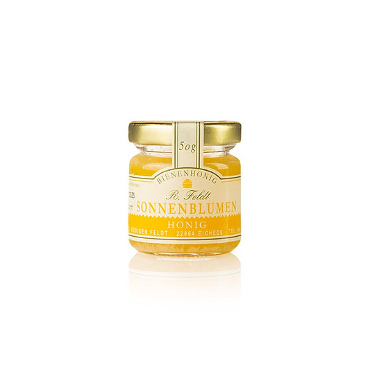 Pot de 50 g de miel de tournesol pur de l'apiculture Feldt, idéal pour les voyages ou comme condiment dans la cuisine.
