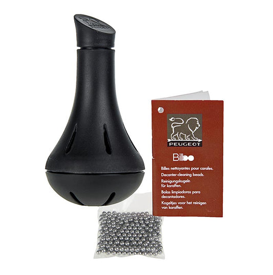 Sfere in acciaio inox per la pulizia dei decanter per vino mediante movimenti circolari in acqua calda
