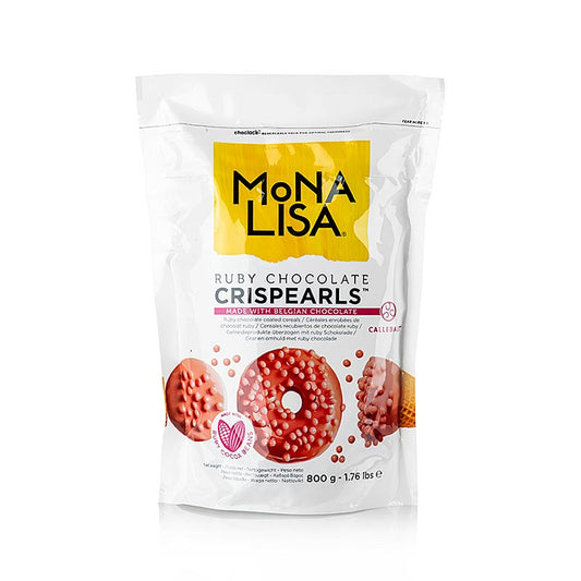 Piccole perle croccanti di cioccolato rosa ricoperte di una copertura rossa fruttata